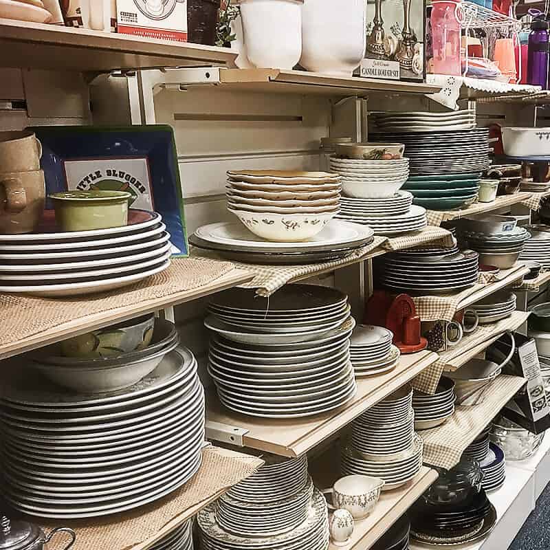 Wayside Cross Thrift Store bargain shoppers find a variety of place settings and dinnerware