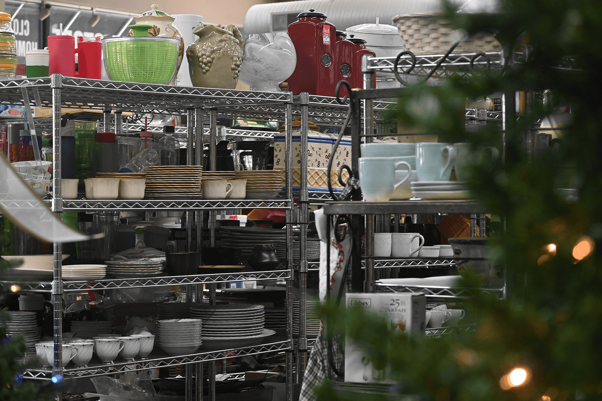 Wayside Cross Thrift Store bargain shoppers find a variety of place settings and dinnerware